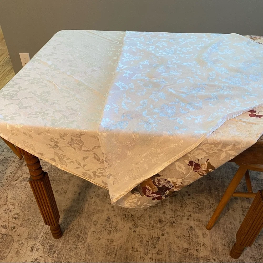 Fruit design tablecloth 56” x 100” in like new condition.